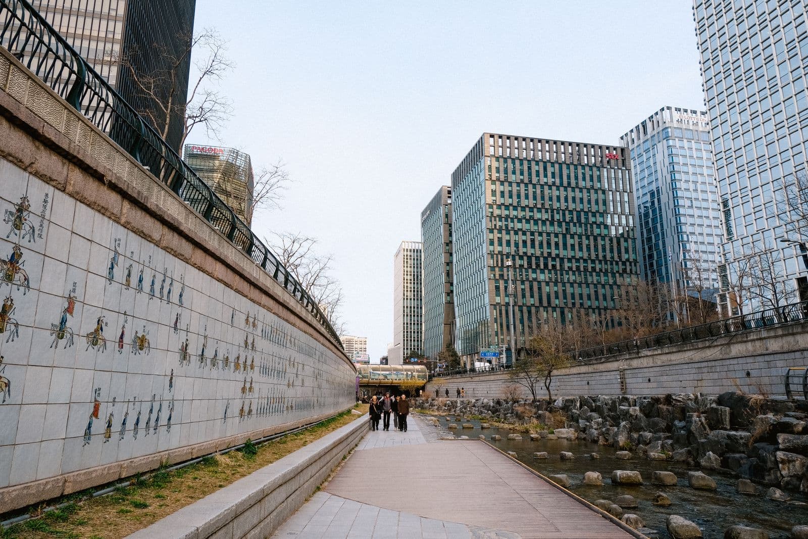 Cheonggyecheon Stream in downtown Seoul glowing with lights at night